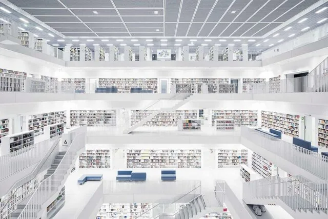 Interior of a modern public library with tall bookshelves