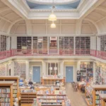 Interior of a public library with tall bookshelves